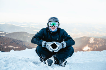 Fototapeta na wymiar Man with snowboard