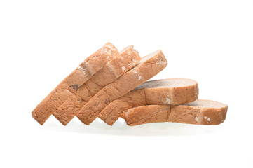 Fresh homemade  baked whole grain bread and sliced bread isolated on white