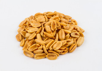 Salt roasted peanuts on a white background