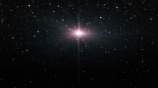 A large Bethlehem Nativity Christmas Eve star or also a supernova nebula shines in a night sky background full of twinkling stars in this perfectly seamless video loop