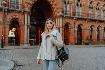 Fototapeta premium Portrait of Charming Young Blonde Girl, Fashion Street Style