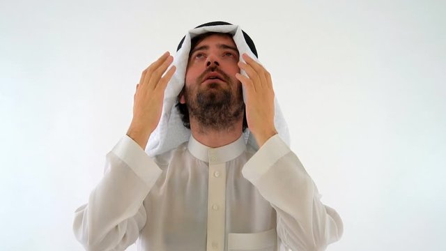 Caucasian Muslim Man Praying in Isolated White Background Studio