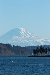mount rainier in the back of the puget sound