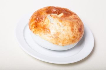Bread covered soup