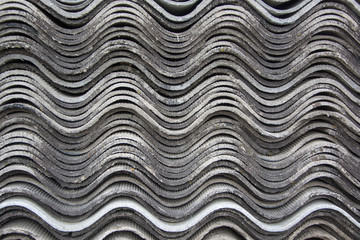 Neatly folded the old slate wavy closeup as a background.