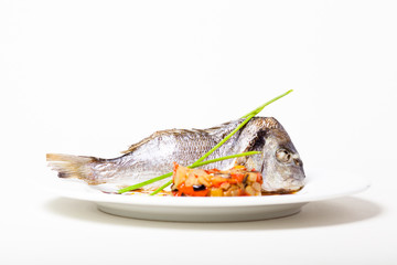 Baked dorado fish with vegetables
