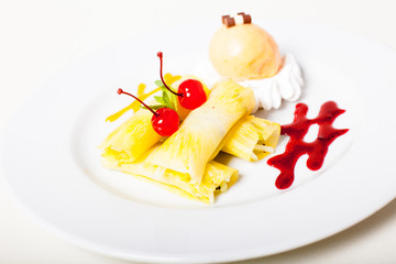 Stuffed pineapple rolls with ice-cream