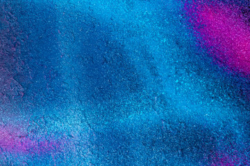 Beautiful bright colorful street art graffiti background. Abstract creative spray drawing fashion colors on the walls of the city. Urban Culture, black ,blue, purple , violet , neon texture
