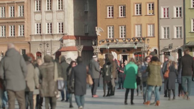Unrecognizable people on the promenade. 