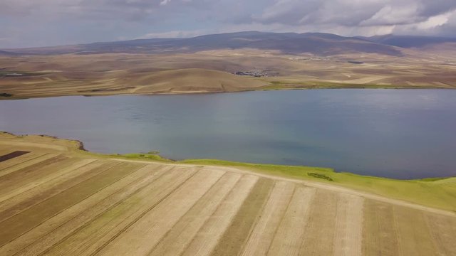 Flying on lake side road and farmland, Cildir, Ardahan, Turkey