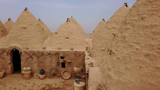 Harran beehive houses that conic roofs, mudbrick wall, Urfa, Turkey