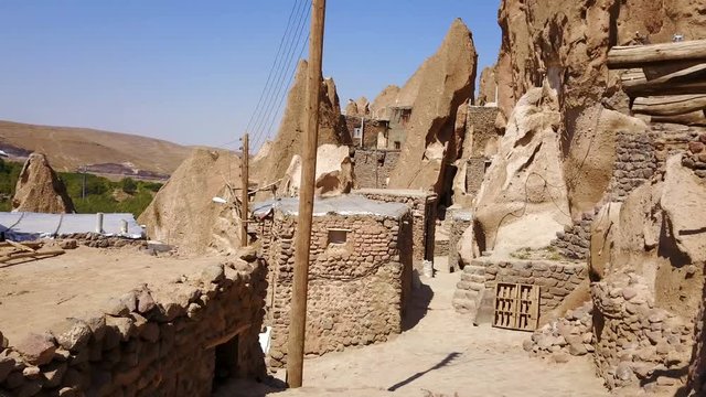 Streets of naturally formed carved rock houses of Kandovan, Iran