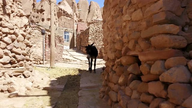 Streets of naturally formed carved rock houses of Kandovan, Iran