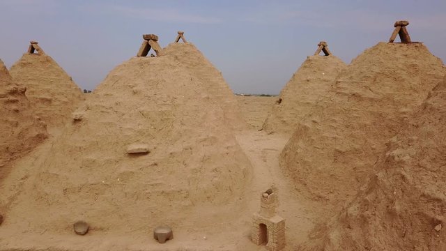 Harran beehive houses that conic roofs, mudbrick wall, Urfa, Turkey