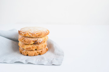Stacked cookies on a linen napkin. Close up.