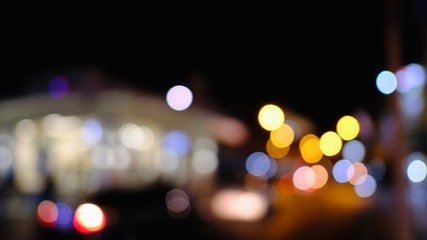 Dark abstract Colorful city Blur background with circular bokeh. space for text. with selective focus