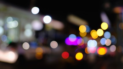 Dark abstract Colorful city Blur background with circular bokeh. space for text. with selective focus