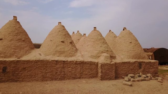 Harran beehive houses that conic roofs, mudbrick wall, Urfa, Turkey