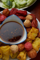 Fried meatball with spicy dipping sauce in Thailand street food