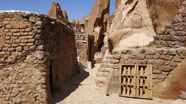 Streets of naturally formed carved rock houses of Kandovan, Iran