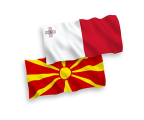 Flags of Malta and North Macedonia on a white background