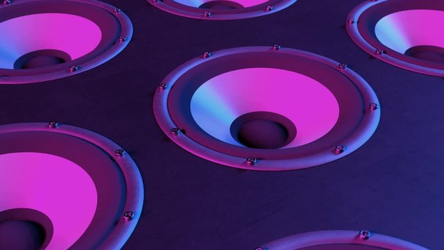 Audio speakers membranes playing modern music at 90 bpm frequency producing loud subwoofer sound. Colored in modern blue and magenta colors. Rock or dance party concept. Close-up, seamless loop.