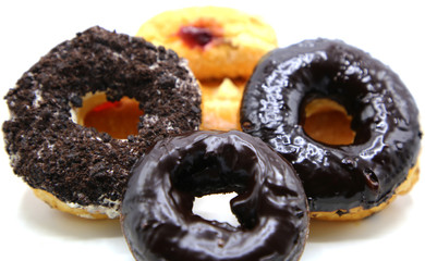 Strawberry jam stuffed , cream and chocolate donut Isolated on White Background