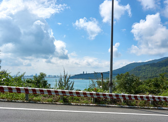 DA NANG, VIETNAM - NOVEMBER 20, 2019: Street at Son Tra Mountain with view over Da nang city,...