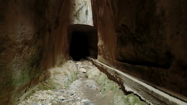 Going thru the darkness in Vespasianus Titus Tunnel, Antakya