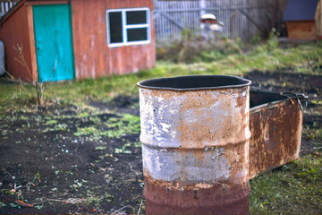 old rusty barrel in the garden