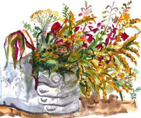 watercolor bouquet of different wildflowers in hand