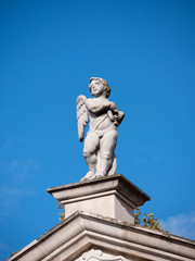Fototapeta na wymiar Angel at the top of the Lady of Health Church in Zadar, Croatia