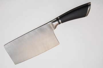 Large sharp cleaver knife with black plactics handles On White background.