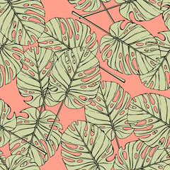 Fototapeta premium Tropical leaves seamless pattern. Palm monstera branch on pink background.