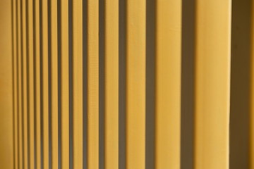 Fototapeta premium soft focus with yellow straight post building at office .