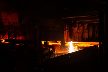 Plakat Hot red steel billets at torch cutting. Background of the blacksmith and metallurgical industry.