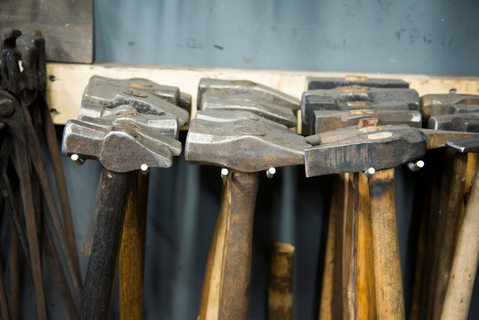 Rows of hammers in workshop