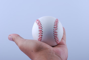 hand hold a professional baseball isolated on white