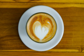 Obraz na płótnie Canvas A cup of cappuccino or coffe latte