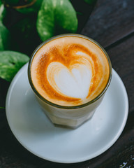 A cup of cappuccino or coffe latte