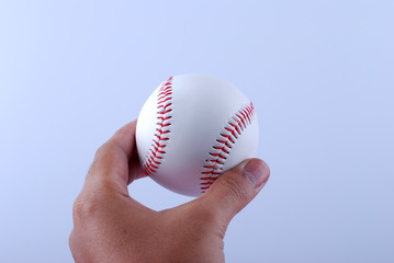 hand hold a professional baseball isolated on white