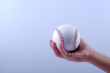 hand hold a professional baseball isolated on white