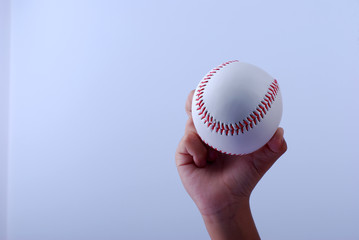 hand hold a professional baseball isolated on white