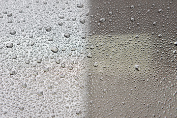 Grey surface with drops of rain water