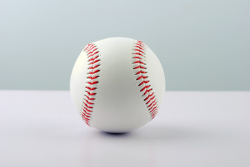 A professional baseball isolated on white.