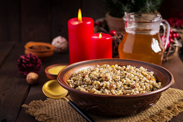 Kutya. Christmas porridge made of wheat grains, poppy seed, nuts, raisins and honey. Christmas kutia. Ukrainian cuisine.