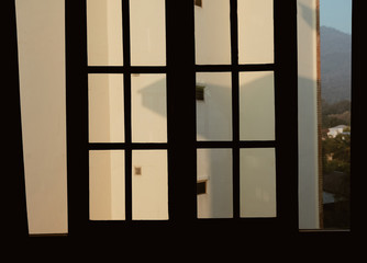 silhouette of closed wooden window