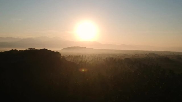 Prettiest sunrise that you will see with a drone descending in the jungle