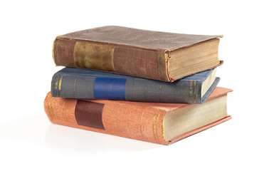 stack of old books isolated on white