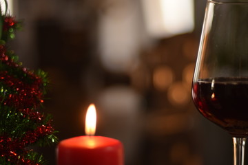 Glogg Wine, Red Candle and a small decorative Christmas Tree
